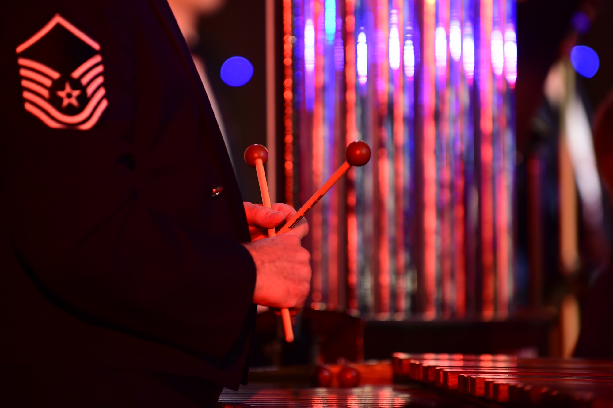 Master Sgt. Steve Przyzycki, plays the marimba, during the U.S. Air Forces in Europe Concert band holiday celebration at Burgess Hall in St. Ives, Cambridgeshire, England, Dec. 18, 2014. (U.S. Air Force photo by Tech. Sgt. Chrissy Best)