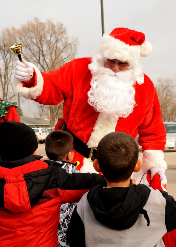 Children greet Santa at the Youth & Family Services Child Development Center in Rapid City, S.D., Dec. 16, 2014. (U.S. Air Force photo by Senior Airman Hailey R. Staker/Released)