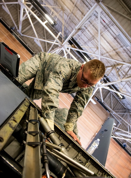 U. S. Air Force Airman 1st Class Robert Crawford, 23d Equipment Maintenance Squadron crew chief, surveys an engine during an isochronal inspection Dec. 8, 2014, at Moody Air Force Base, Ga. ISO inspections are designed to extend an aircraft’s service life.  (U.S. Air Force photo by Airman 1st Class Ceaira Tinsley/Released)