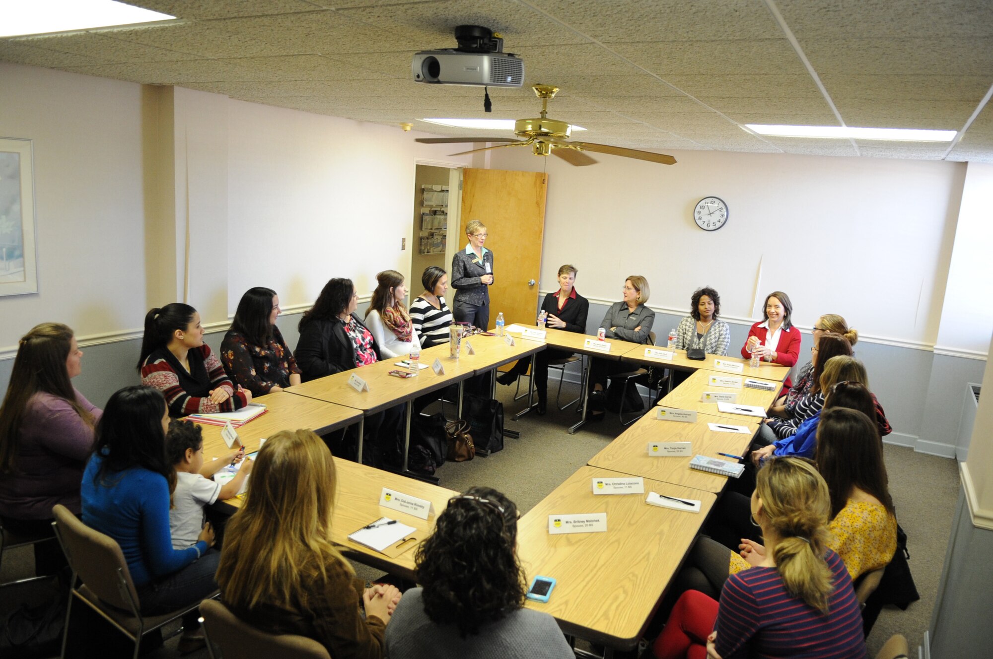 Air Force Global Strike Command spouses meet with spouses from the Key Spouse’s groups on Barksdale Air Force Base, La. Dec. 16, 2014. The spouses discussed various ways to recruit new members along with ways to help Airmen and their families within each respective squadron. (U.S. Air Force photo/Senior Airman Kristin High)