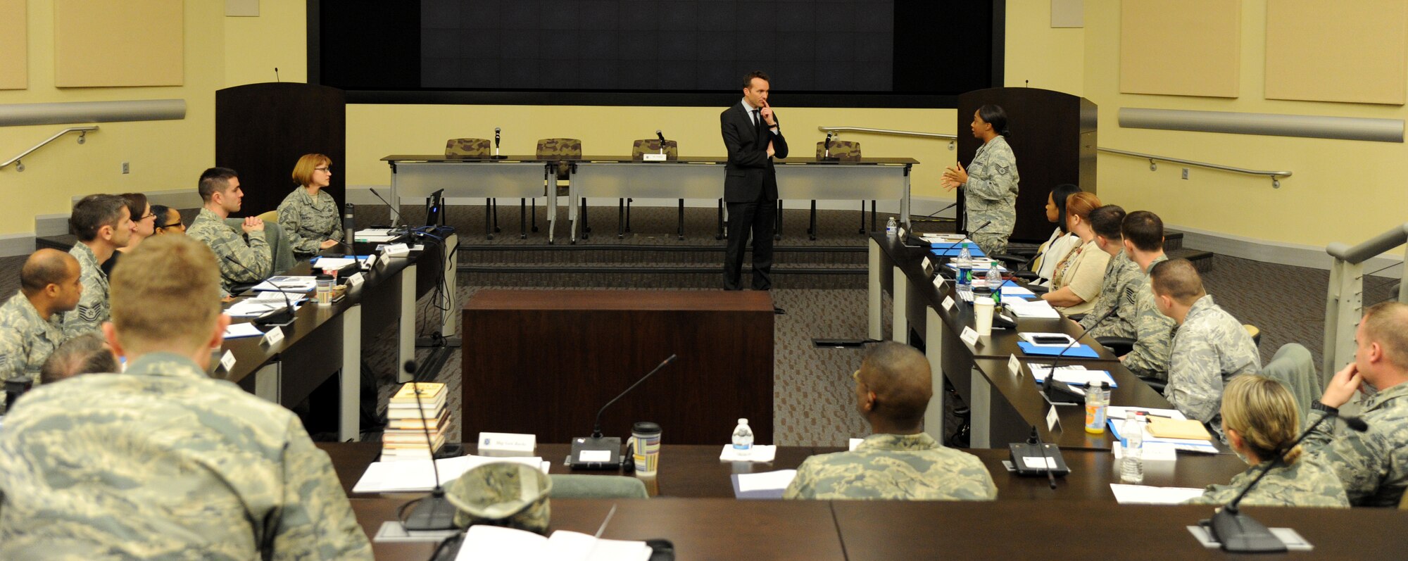 The Honorable Eric Fanning, Under Secretary of the Air Force, listens as Staff Sgt. Karin Nelson asks a questions about reserve duty during the annual Air Force District of Washington Capital Airman Seminar at Joint Base Andrews, Md., Dec. 16, 2014. Fifty-one enlisted, officer, and civilian Airmen were selected from across the National Capital Region to attend the four-day professional development seminar. Nelson, a Reservist assigned to the 459th Air Refueling Wing as an aerospace medical technical, is on active-duty orders at the AFDW. (U.S. Air Force photo/Master Sgt. Tammie Moore)