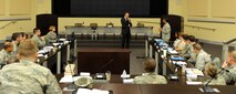 The Honorable Eric Fanning, Under Secretary of the Air Force, listens as Staff Sgt. Karin Nelson asks a questions about reserve duty during the annual Air Force District of Washington Capital Airman Seminar at Joint Base Andrews, Md., Dec. 16, 2014. Fifty-one enlisted, officer, and civilian Airmen were selected from across the National Capital Region to attend the four-day professional development seminar. Nelson, a Reservist assigned to the 459th Air Refueling Wing as an aerospace medical technical, is on active-duty orders at the AFDW. (U.S. Air Force photo/Master Sgt. Tammie Moore)