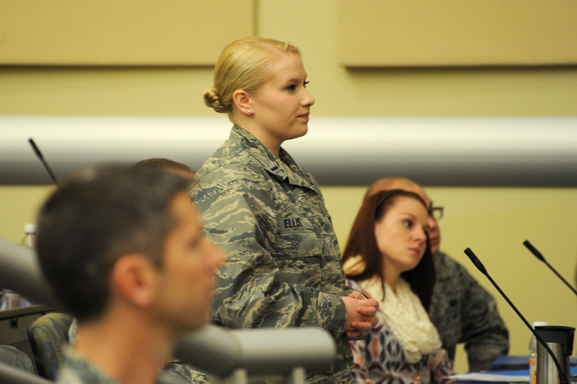 1st Lt. Alexandra Ellis asks a question during the annual Air Force District of Washington Capital Airman Seminar at Joint Base Andrews, Md., Dec. 16, 2014. Fifty-one enlisted, officer, and civilian Airmen were selected from across the National Capital Region to attend the four-day professional development seminar. Ellis is an 11th Comptroller Squadron budget analyst.  (U.S. Air Force photo/Master Sgt. Tammie Moore)