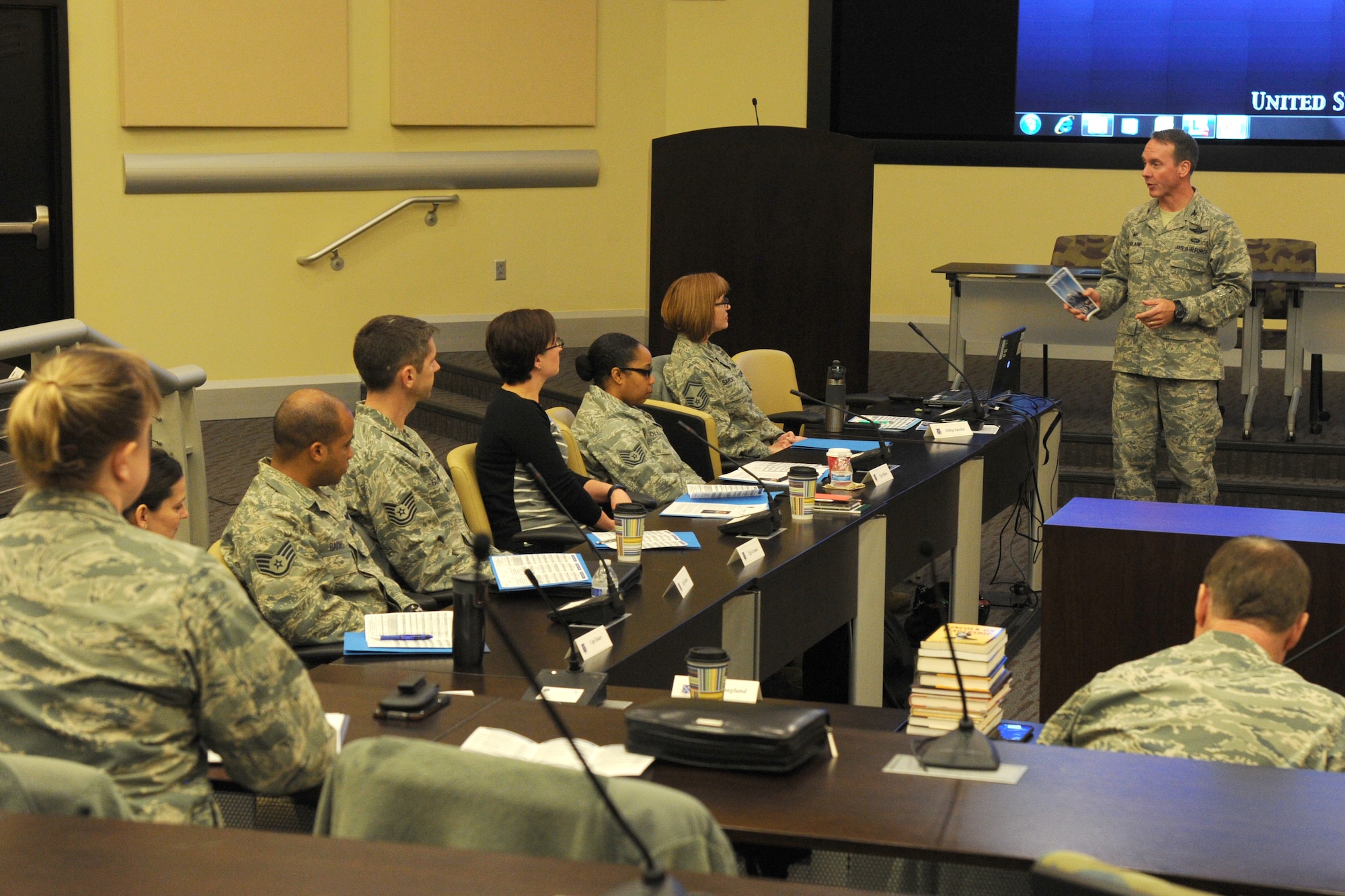 The 11th Wing Commander Col. Bradley Hoagland addresses the audience during the annual Air Force District of Washington Capital Airman Seminar at Joint Base Andrews, Md., Dec. 16, 2014. The four-day seminar features mentorship sessions hosted by senior-level Air Force leaders including the Under Secretary of the Air Force the Honorable Eric Fanning and Vice Chief of Staff Gen. Larry Spencer. (U.S. Air Force photo/Master Sgt. Tammie Moore)