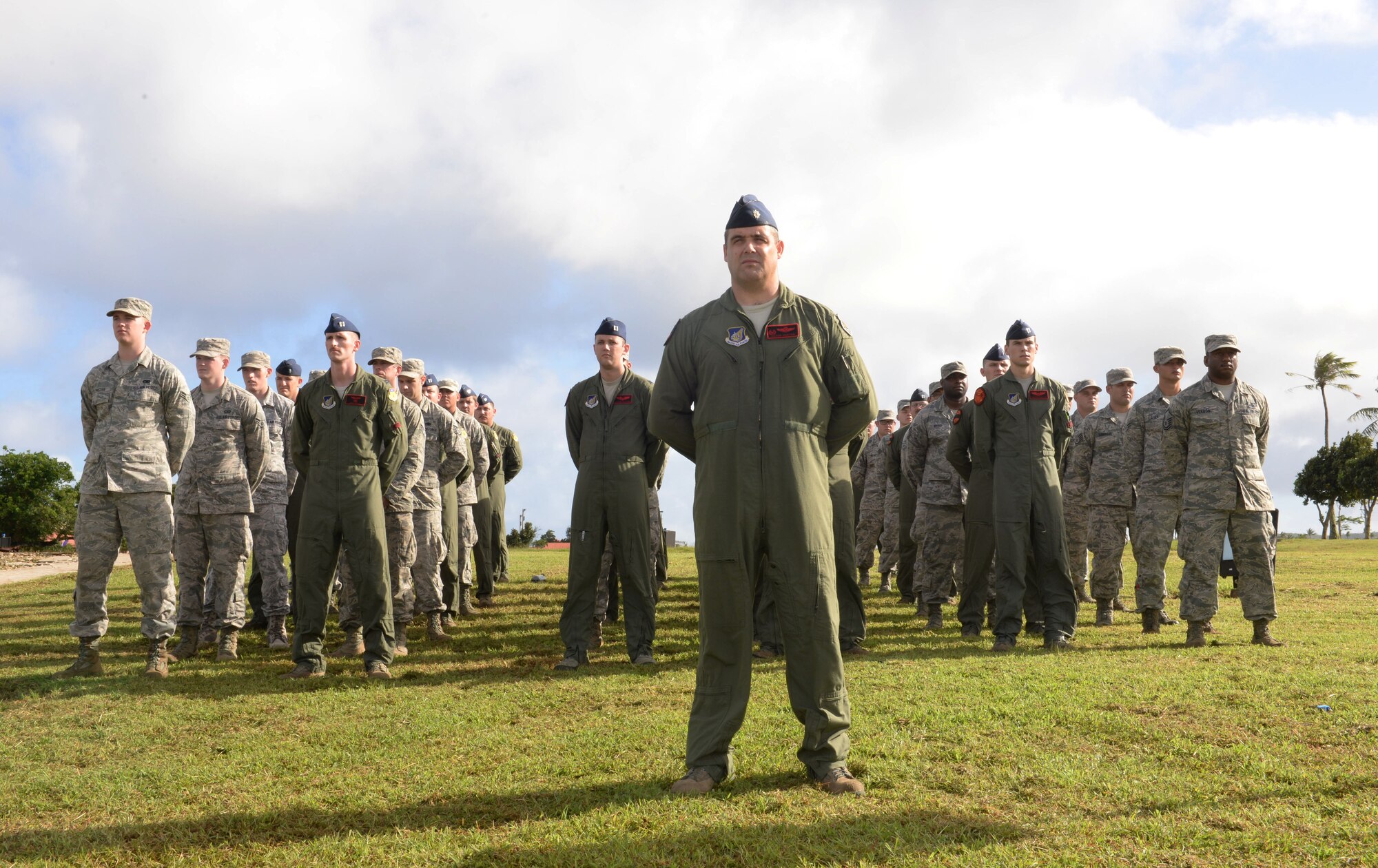 Members from Team Andersen and the 96th Expeditionary Bomb Squadron deployed
from Barksdale Air Force Base, La., stand in formation during the Operation
Linebacker II Remembrance Ceremony Dec. 18, 2014, at Andersen AFB, Guam. The
ceremony commemorated the 75 Airmen that lost their lives during the
operation including 33 who were lost from 15 downed B-52 Stratofortress
bombers. (U.S. Air Force photo by Staff Sgt. Robert Hicks/Released)
