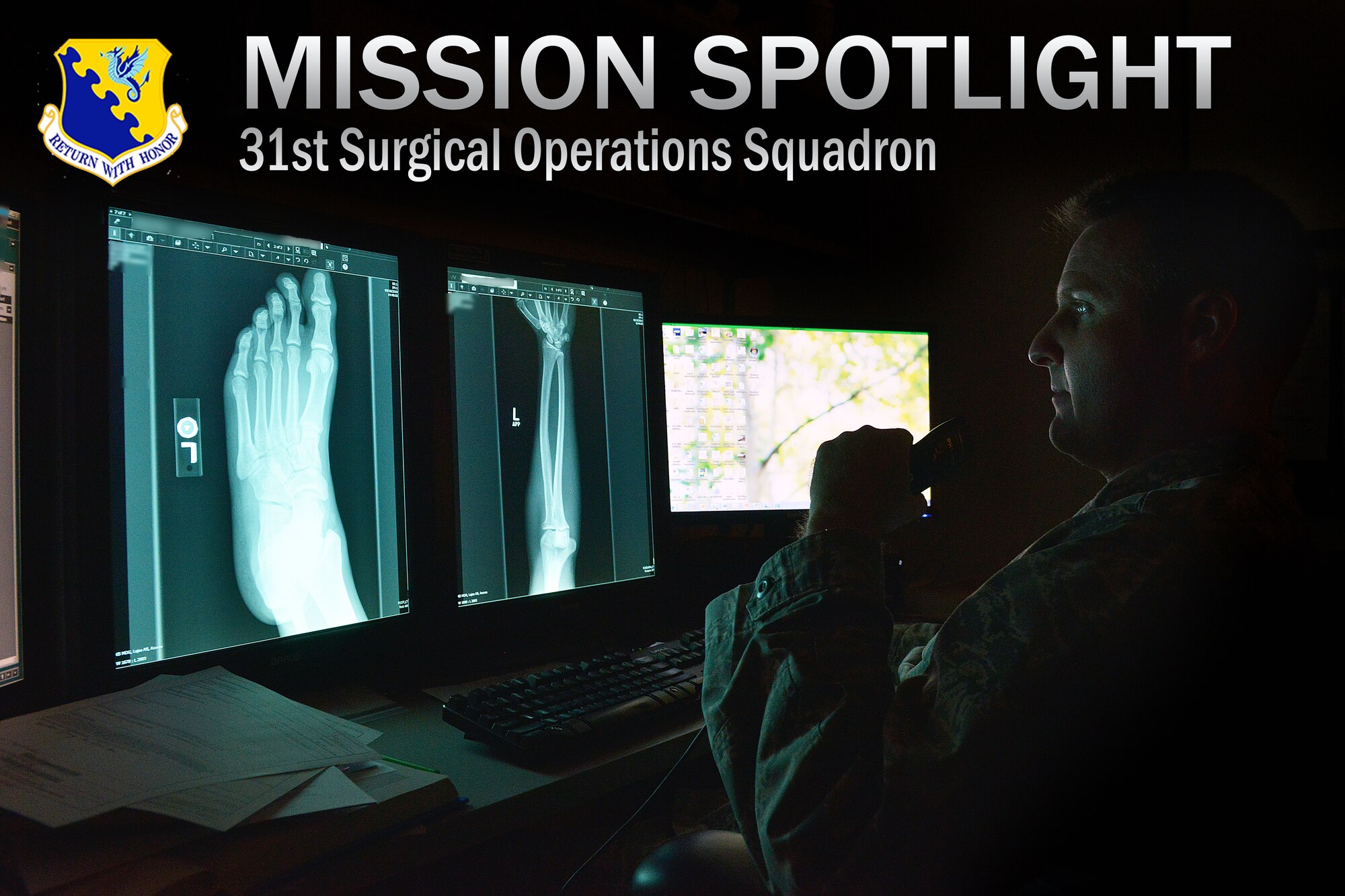 Lieutenant Colonel David Ives, 31st Surgical Operations Squadron radiologist, takes notes using a dictation machine while reviewing x-rays, Dec. 16, 2014, at Aviano Air Base, Italy. The 31 SGC radiology team is made up of eight enlisted diagnostic technicians and one doctor who specializes using imaging to diagnose and treat diseases seen within the body. (U.S. Air Force photo/Airman 1st Class Ryan Conroy) 