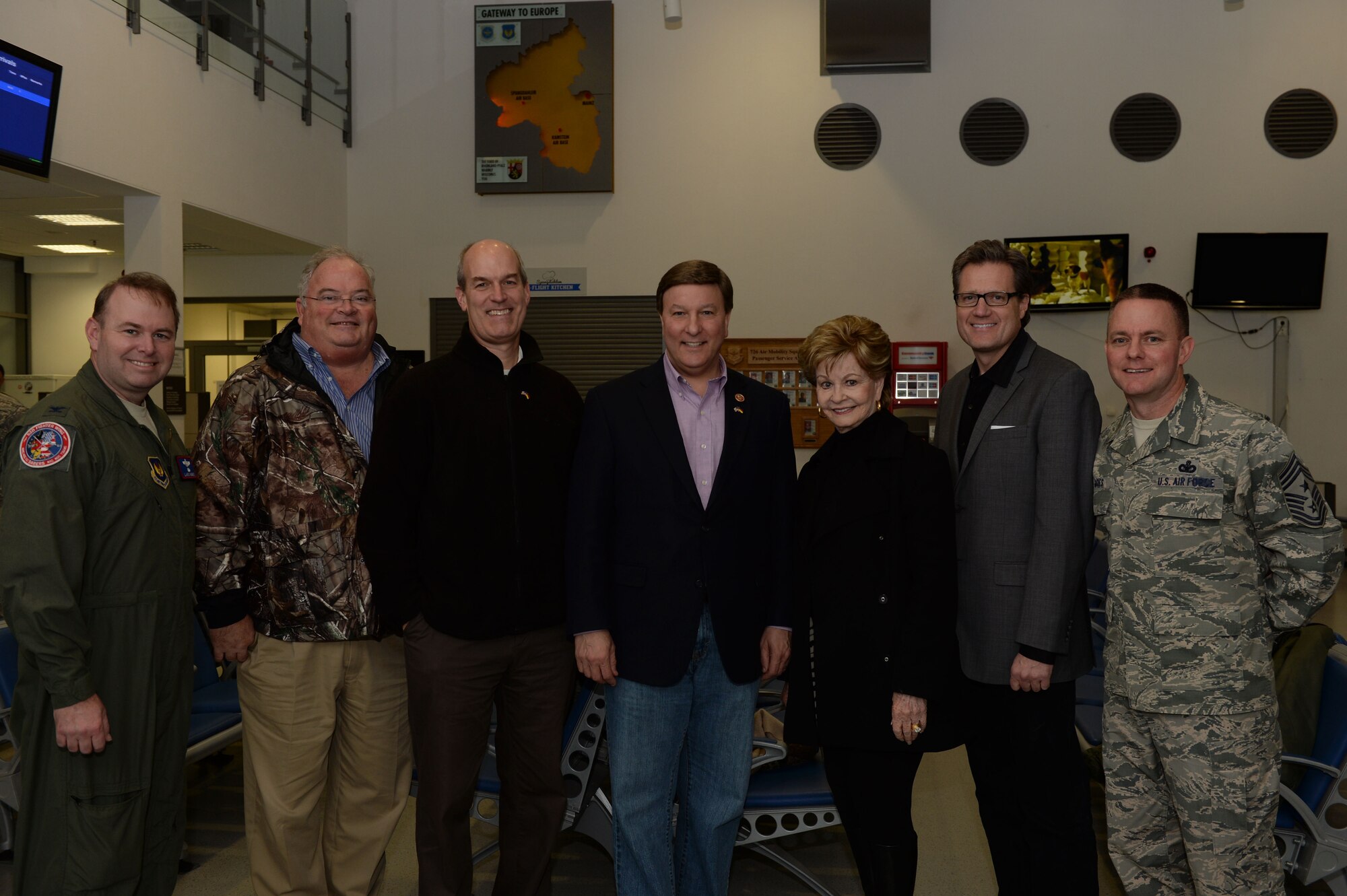 U.S. Air Force 52nd Fighter Wing leadership and five U.S. congressmen pose for a photo during an immersion visit Dec. 17, 2014, at Spangdahlem Air Base, Germany. As part of their trip to Europethe congressional delegation visited the 52nd FW to learn about the wing’s mission and talk with its Airmen.(U.S. Air Force photo by Airman 1st Class Dylan Nuckolls/Released)