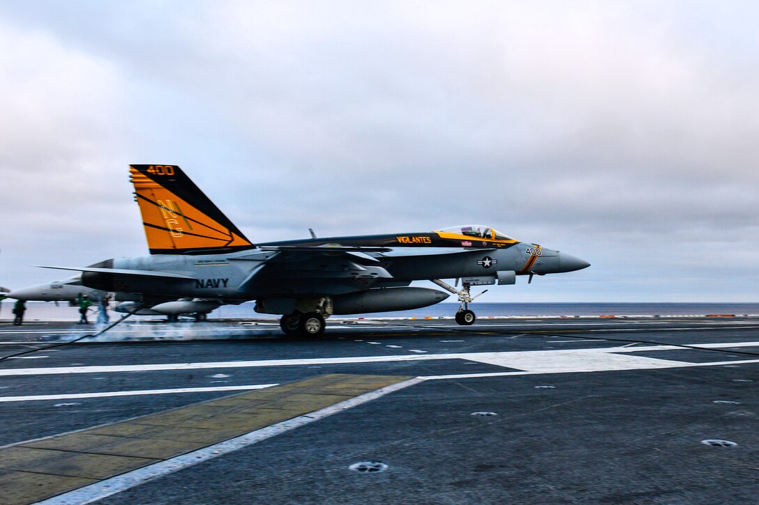 U.S. Navy Capt. Stuart Baker, commander of Carrier Air Wing 9, makes his 1,000th arrested landing on the flight deck of the aircraft carrier USS John C. Stennis during the ship’s flight deck certification in the Pacific Ocean, Dec. 11, 2014.