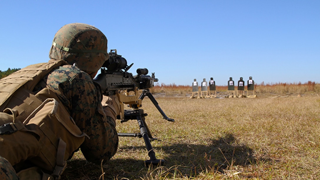 A Marine with Bravo Company, Battalion Landing Team 3rd Battalion, 6th Marine Regiment, 24th Marine Expeditionary Unit, fires an M240B machine gun during a weapons calibration exercise at Camp Lejeune, N.C., Nov. 7, 2014. The Marines conducted the training to ensure all weapon systems are working properly and are ready for the upcoming deployment at the end of the year. Bravo Co. is the BLT’s Light Armored Reconnaissance detachment from 2nd Light Armored Reconnaissance Battalion, 2nd Marine Division.  (U.S. Marine Corps photo by Lance Cpl. Austin A. Lewis)