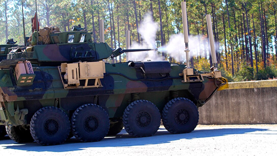 Armored Vehicle with Bravo Company, Battalion Landing Team 3rd Battalion, 6th Marine Regiment, 24th Marine Expeditionary Unit, fires its 25mm cannon during a weapons calibration exercise at Camp Lejeune, N.C., Nov. 7, 2014. The Marines conducted the training to ensure all weapon systems are working properly and are ready for the upcoming deployment at the end of the year. Bravo Co. is the BLT’s Light Armored Reconnaissance detachment from 2nd Light Armored Reconnaissance Battalion, 2nd Marine Division.  (U.S. Marine Corps photo by Lance Cpl. Austin A. Lewis)