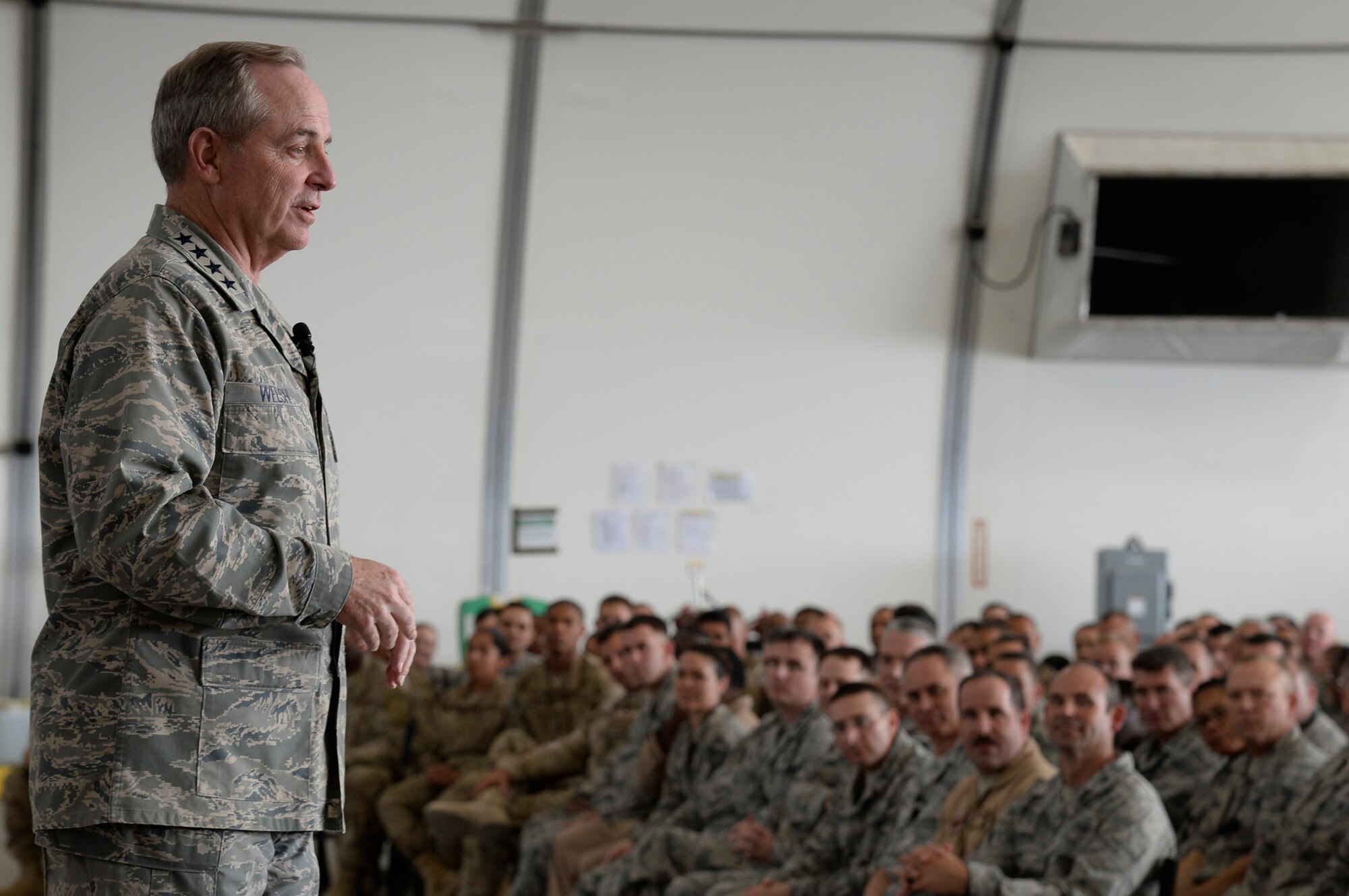 Air Force Chief of Staff Gen. Mark A. Welsh III addresses Airmen during a wing wide all call at an undisclosed location in Southwest Asia Dec. 16, 2014. Some of the topics discussed during the all call were using common sense, increasing communication in the chain of command and the importance of getting to know each other. (U.S. Air Force photo/Tech. Sgt. Marie Brown)