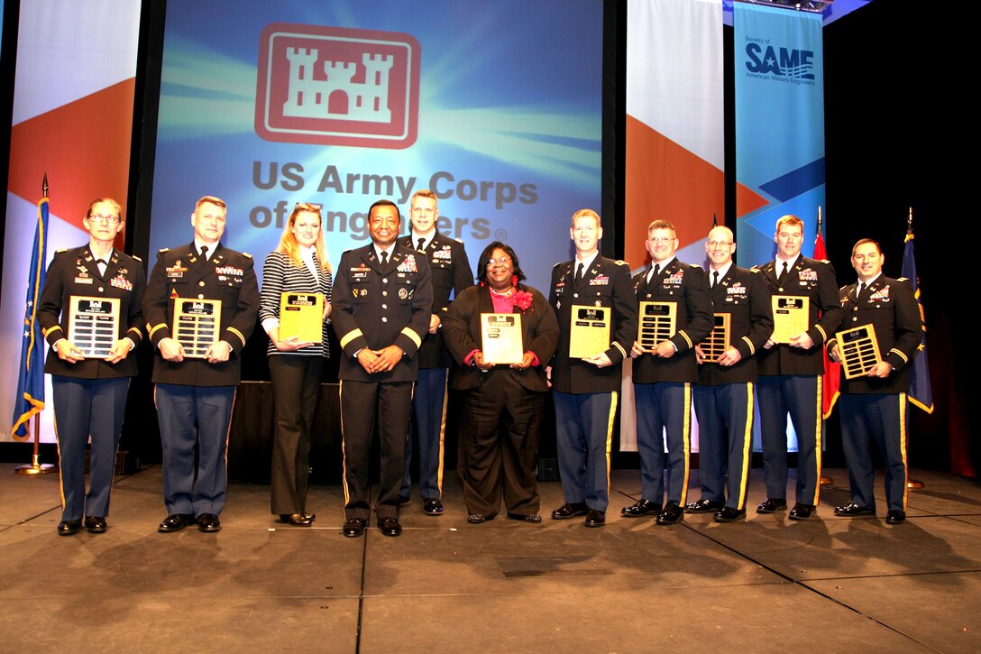 Dec. 8 to Dec. 12 the Society for American Military Engineers (SAME) held their annual Small Business Conference in Kansas City, Mo. At the conference the U.S. Army Corps of Engineers, Seattle District, received awards for being in the Top 10 in Fiscal Year 2014 for percentage of dollars awarded and total dollars awarded to Service Disabled Veteran Owned Small Business. Col. John Buck (far right), Seattle District commander accepted the award on behalf of the district.
