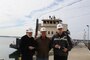 Hans Honerlah (center), U.S. Army Corps of Engineers, Baltimore District program manager, recognizes Army veterans Bob Shultz (left) and Charlie Harmon (right) for their service on the STURGIS. 