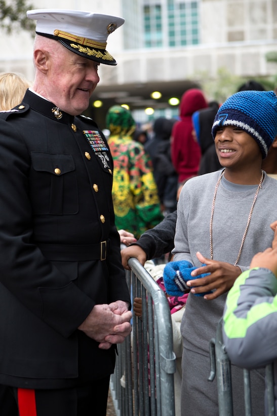 Lt. Gen.  Richard P. Mills, commander of Marine Forces Reserve, greeted 
and passed out toys to children and family members at New Orleans City Hall, Dec. 20, 2014, during the ZULU Social Aid and Pleasure Club’s Toys for Tots distribution event. Toys and bikes were passed out to hundreds of local children during the event. 
