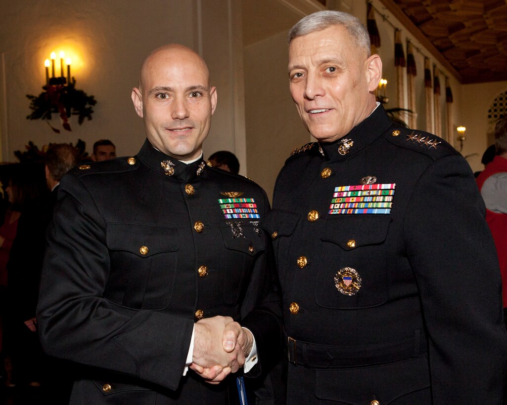 The Assistant Commandant of the Marine Corps, Gen. John M. Paxton, Jr., right, poses for a photo at the Naval Postgraduate School, Monterey, Ca., Dec. 19, 2014. (U.S. Marine Corps photo by Cpl. Tia Dufour/Released)