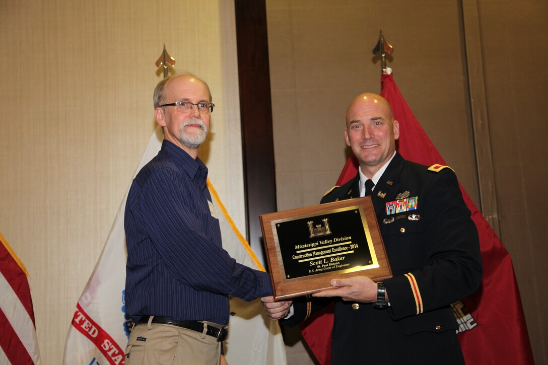 Scott Baker, engineering and construction, was recognized for his work along the Mississippi River by Col. Dan Koprowski, district commander, at the district's annual holiday awards ceremony in December. Baker was selected as the Mississippi Valley Division Construction Management Excellence Award
recipient. The annual award recognizes
construction personnel exhibiting
excellence in construction management
and contract administration activities.