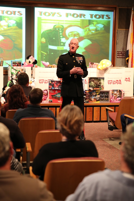 Lt. Gen. Richard P. Mills, commander of Marine Forces Reserve, speaks to workers at Michoud Assembly Facility Dec. 19, 2014, during a presentation of toys donated by the workers to the Marine Corps Reserve Toys for Tots foundation. Mills thanked the guests for their generosity so underprivileged children in the local area can receive a gift during the holiday season. (U.S. Marine Corps photo by Cpl. Brytani Musick)
