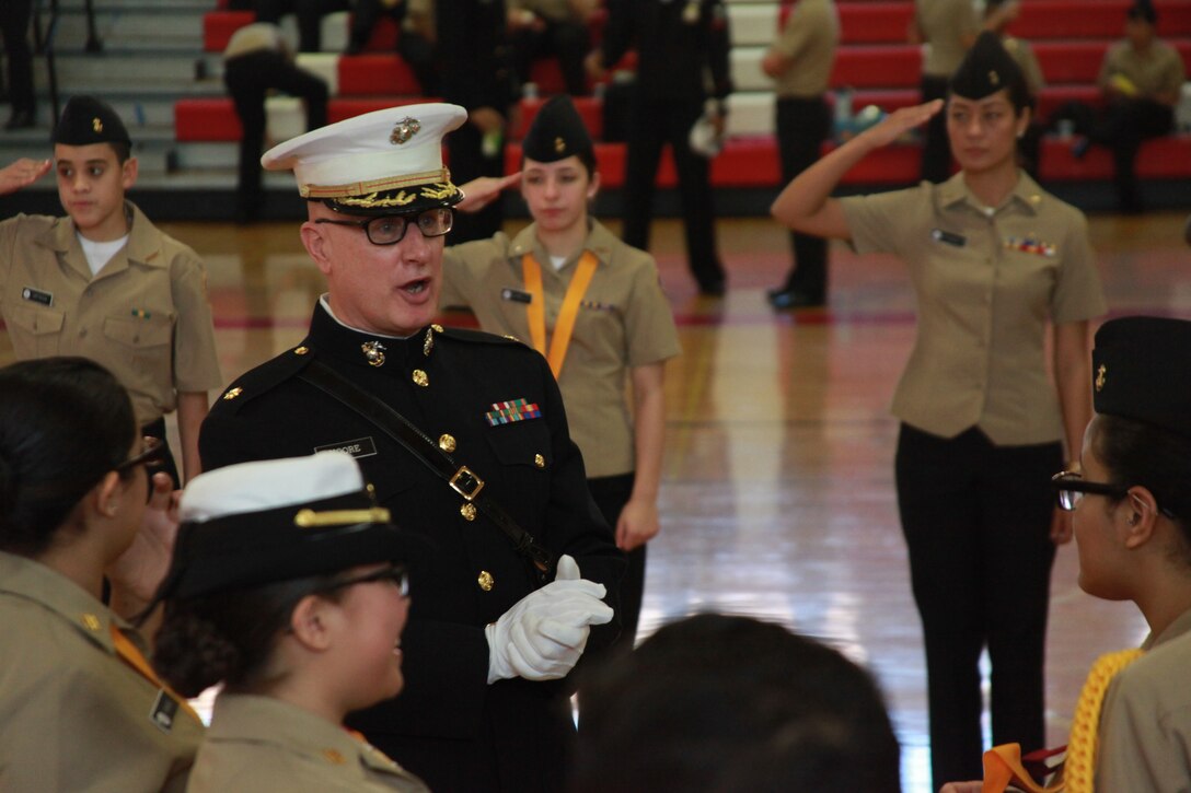 Retired Marine Corps Maj. Donald Moore speaks to cadets before the parade begins Dec. 17. “Our main focus isn’t to have cadets enlist into the military our focus is to teach leadership and to create better citizens,” said Moore, the head Naval Junior Reserve Officer Training Corps instructor at Freeport High School.