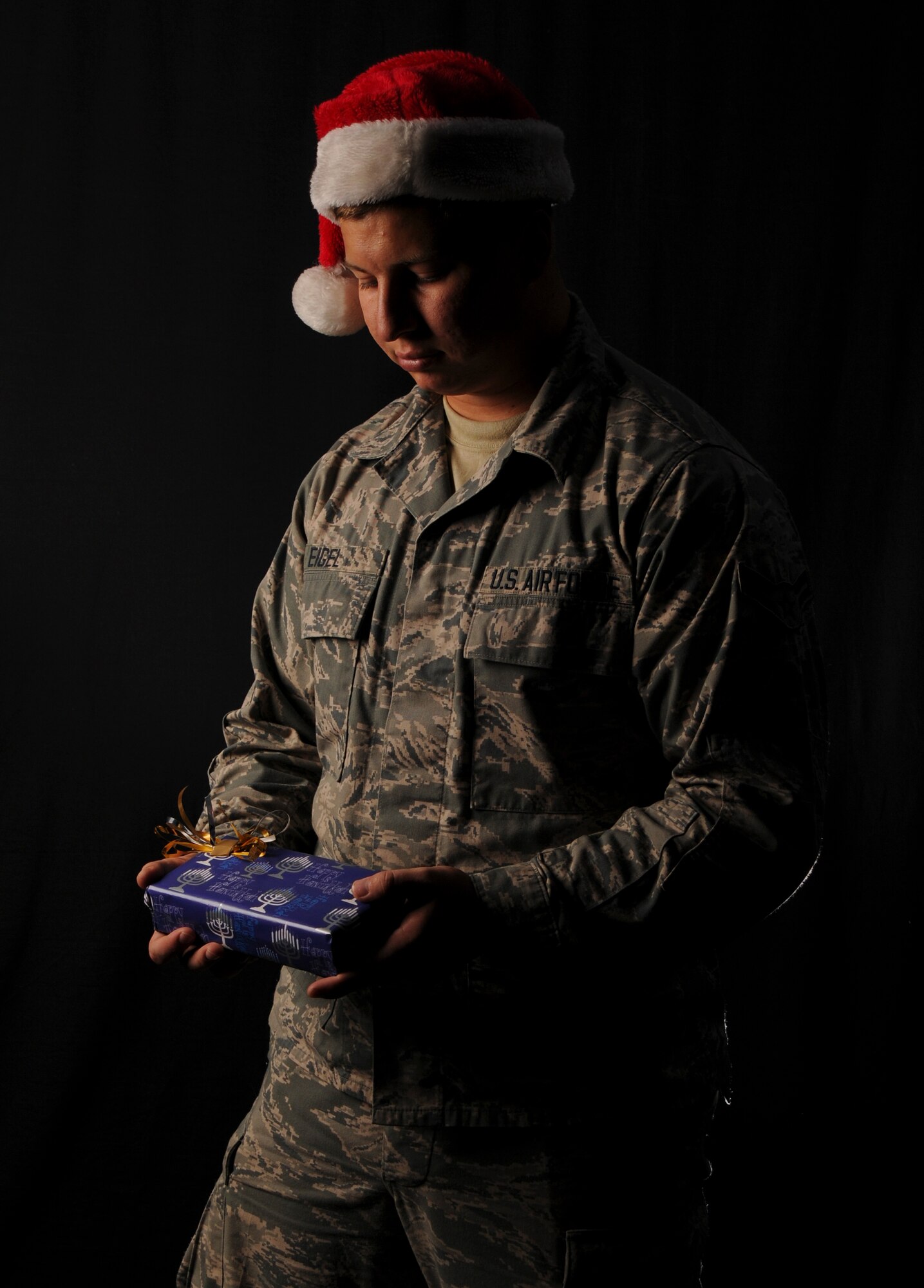 Every year thousands of Airmen spend their holiday season away from family members while stationed overseas. The winter season can inflict higher levels of stress and loneliness in an individual, making it an important time for Airmen to look out for one another. Kadena Air Base mental health and chapel services are available to provide service members and their families with mental and emotional support throughout the year. (U.S. Air Force photo illustration by Airman 1st Class John Linzmeier)
