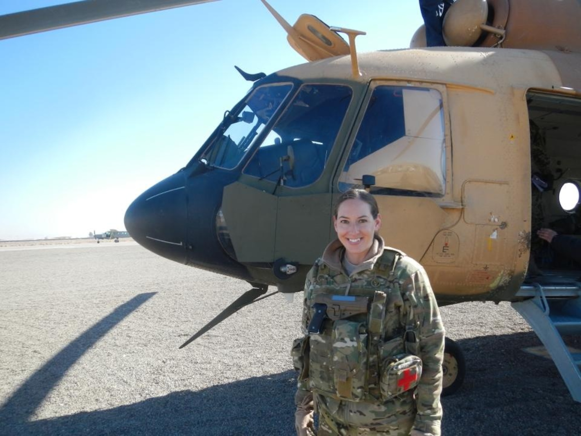 Maj. Mary Clark, a UH-1N Huey instructor pilot and the 58th Operations Support Squadron's assistant director of operations, recently made an impact by training pilots, male and female, for the Afghan Air Force at Shindand Air Base, Afghanistan. (Courtesy photo)
