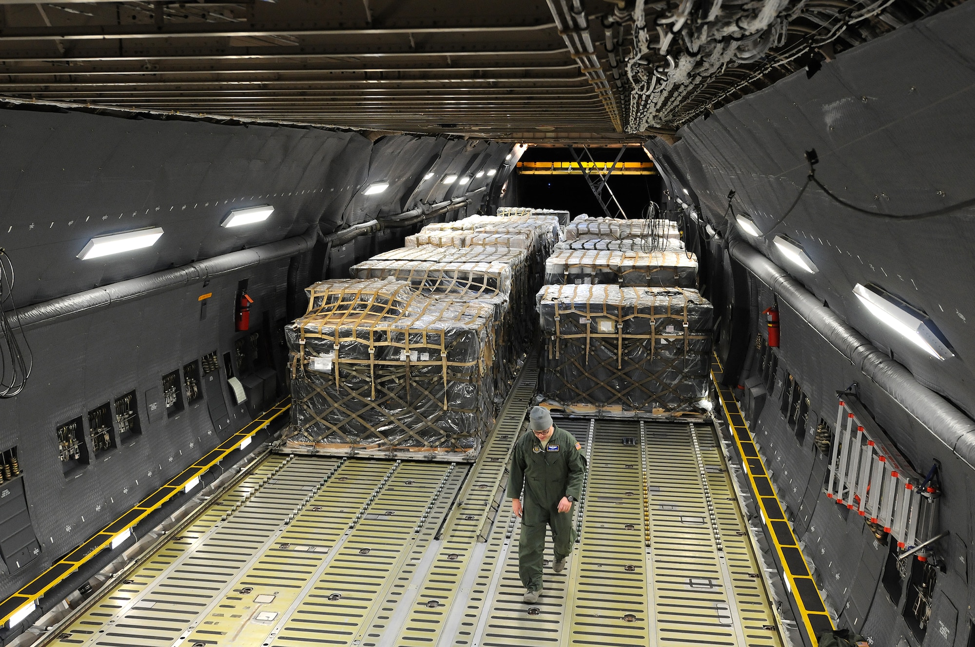 Reserve Airmen from the 512th Airlift Wing delivered humanitarian supplies to Nicaragua aboard a C-5M Super Galaxy Dec. 20, 2014 just in time for the Holidays. 125,000 pounds of food and educational equipment were airlifted to Nicaragua's Augusto C. Sandino International Airport in Managua. The massive delivery was made possible through the Denton Program, a Department of Defense humanitarian assistance transportation program that utilizes space available military air, surface and sea-lift assets. The supplies were provided to World Missions Outreach, which is an international nonprofit organization based in Nicaragua that provides food, education, medical and ministry services to the country's citizens.(U.S. Air Force photo/2nd Lt. Steve Lewis)