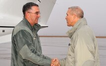 Gen. John E. Hyten, Air Force Space Command commander, greets Col. Paul Bauman, 319th Air Base Wing commander, Dec. 22, 2014 on Grand Forks Air Force Base, N.D. Hyten made the trip from Peterson Air Force Base, Colo., to visit members of Cavalier Air Station, N.D., ahead of the winter holidays. (U.S. Air Force photo/Staff Sgt. Susan L. Davis)