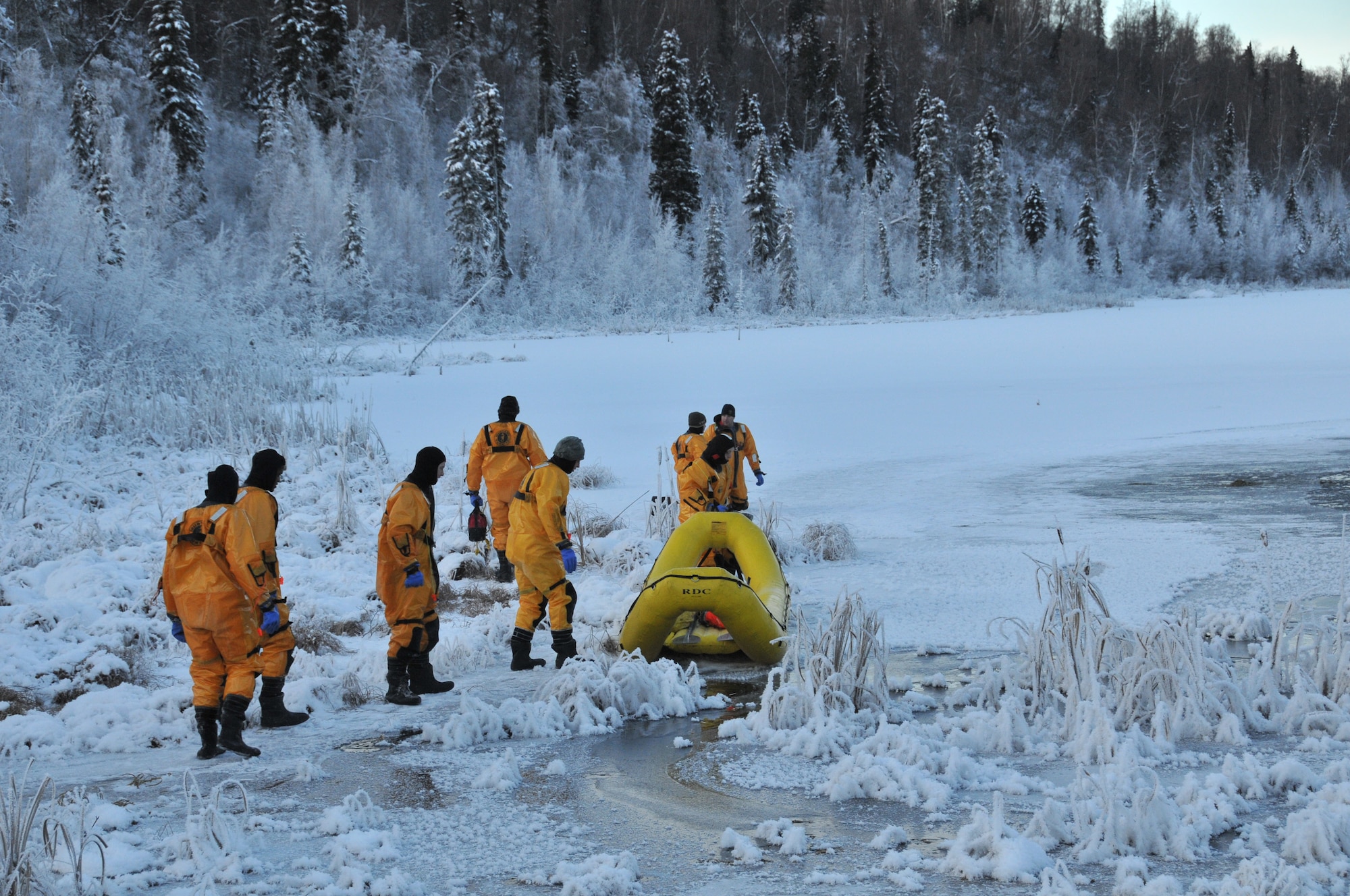 JOINT BASE ELMENDORF-RICHARDSON -- Firefighters of the 673d Civil Engineer Squadron, Joint Base Elmendorf-Richardson, deal with heat, fire and water on a regular basis. Annually though, these firefighters practice their ice water rescue techniques. 
The training prepares firefighters on the proper methods of water rescue; when minutes and seconds count, it pays to be ready to act instinctively. People panic because they haven't practiced, and practice is just what the firefighters were doing last weekend.
Given the number of lakes and open-water sources on and around JBER, water activity and snowmachines could lead to a higher volume of incidents. (U.S. Air Force photo/Mr. Tommie Baker)