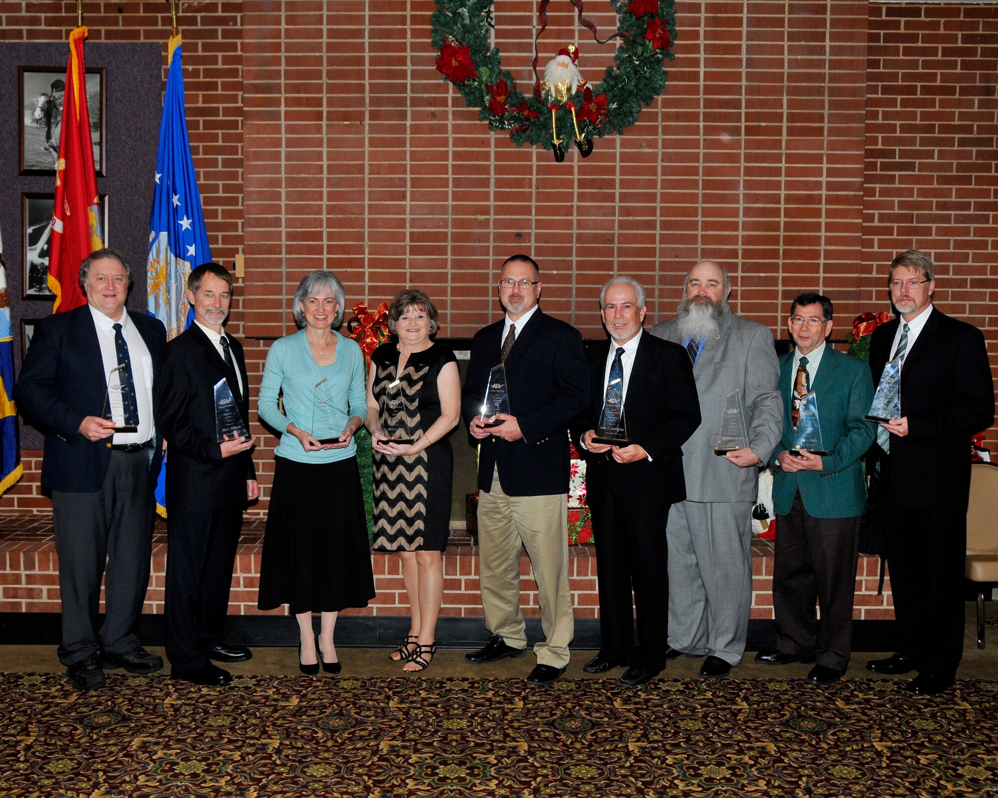 The Aerospace Testing Alliance (ATA) awarded personnel for their exceptional performance at the Annual 2014 ATA Award Ceremony on Dec. 2 at the Arnold Lakeside Club. Award winners pictured left to right are Sidney Steely Jr., Alan Milhoan, Kristi Farris, Alecia Davis, James Thompson, Lester Cunningham, Mitchell Kendrick, Phillip Medley and Hunter Beavers. Award winners not pictured are Andrew Jackson, Noel Pujol Jr. and Floyd Gibbs. (Photo by Rick Goodfriend)