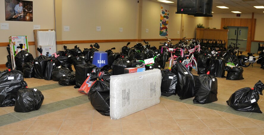 Shown here at the AEDC Angel Tree collection location are gifts for 101 angels that were donated by AEDC personnel. Counselors from the South Central Relative Caregiver Program and the Healthy Families Program collected the items on Dec. 10 and the gifts will be provided to families in need. (Photo by Jacqueline Cowan)
