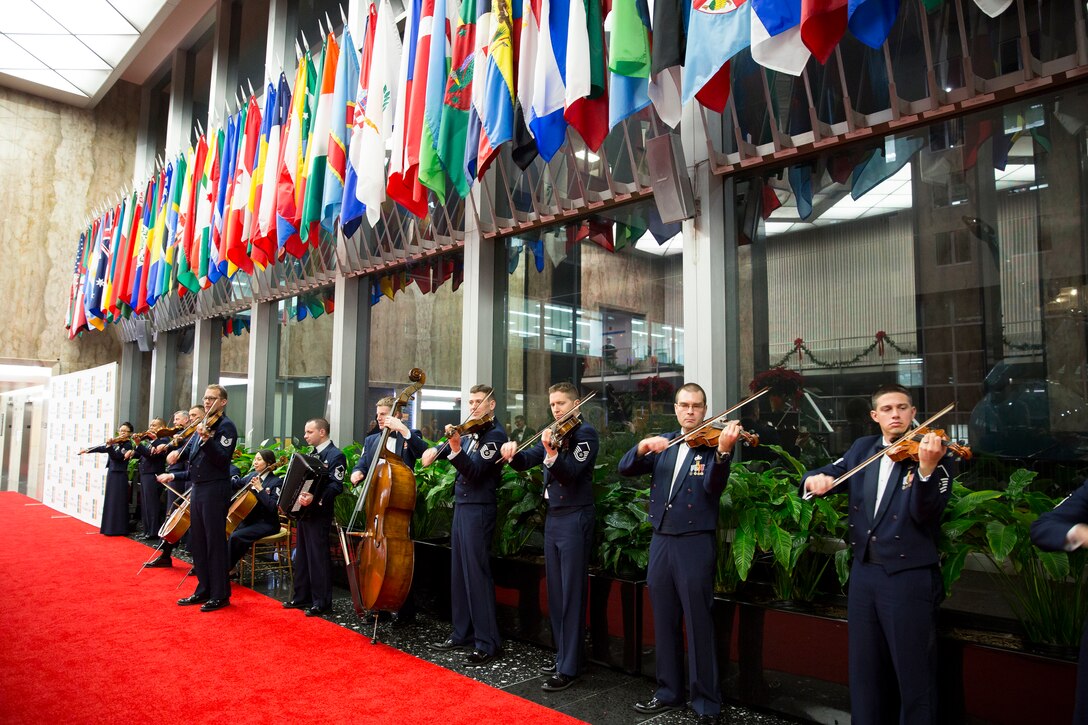 Members of the Air Force Strings, led by Technical Sgt. Luke Wedge, perform on the red carpet before the Kennedy Center Honors. (Photo by Scott Suchman/released)
