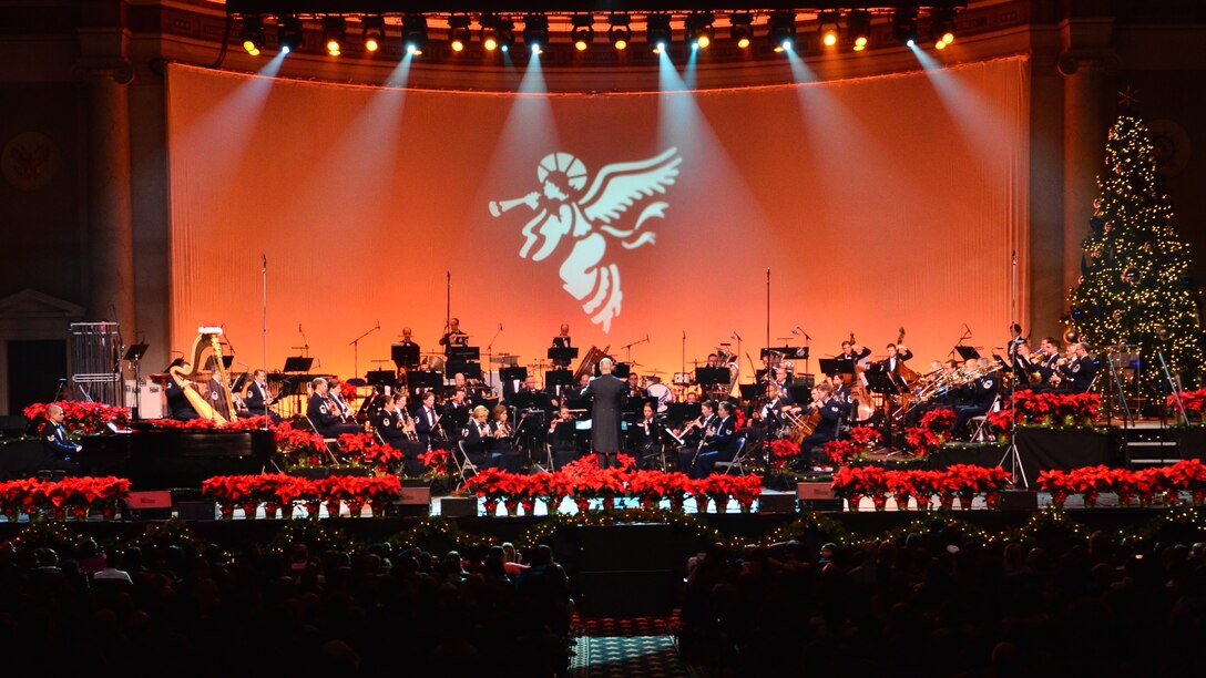 The U.S. Air Force Concert Band perform the opening number, "Hark the Herald Trumpets Sing," during the 8th annual Holiday Matinee for Kids performance at D.A.R. Constitution Hall on Friday, Dec. 12. (U.S. Air Force photo by Senior Master Sgt. Bob Kamholz/released)
