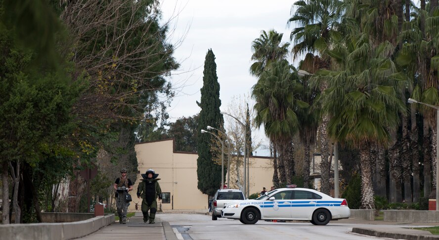 Senior Airman Aaron Haak, 39th Civil Engineer Squadron Explosive Ordnance Disposal journeyman, (left), and Staff Sgt. Daniel Esselstrom, 39th CES EOD craftsman, (right), participate in an emergency response exercise Dec. 19, 2014, at Incirlik Air Base, Turkey. Units from all over base participated in the exercise to ensure they are trained and ready for emergencies at a moment’s notice. (U.S. Air Force photo by Airman Cory W. Bush/Released)