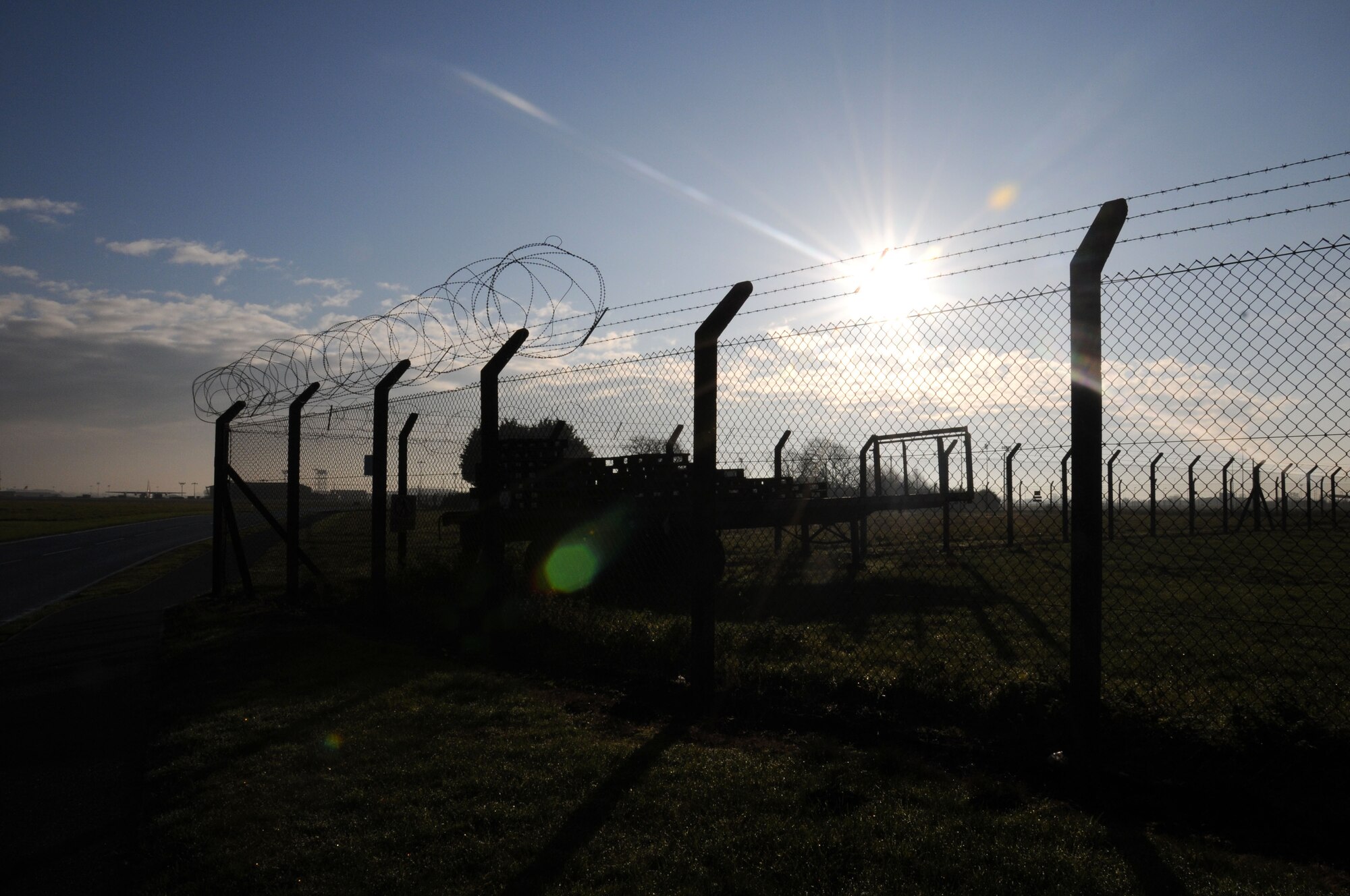 A fence helps the 100th Security Forces Squadron service members protect the base Dec. 5, 2014, on RAF Mildenhall, England. The fence is patrolled on a regular basis by the 100th SFS Military Working Dog section to ensure the safety of the base and its population. (U.S. Air Force photo by Gina Randall/Released)