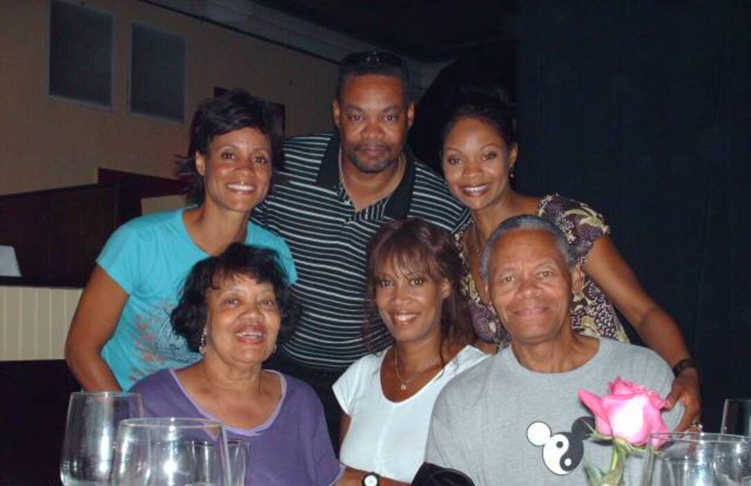 Mike Cornish looks forward to spending more time with his family.  Family members pictured in this photo (left to right) include his mom, Elsie, dad, Milton, and his three sisters; Michelle, Brenda and Elsa