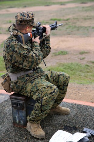 Recruit Wells A. Scott, Platoon 3246, takes aim at his target before moving to the standing position at Edson Range, Marine Corps Base Camp Pendleton, Dec. 16. Scott is a Nampa, Idaho, native and was recruited out of Recruiting Substation Boise, Idaho.