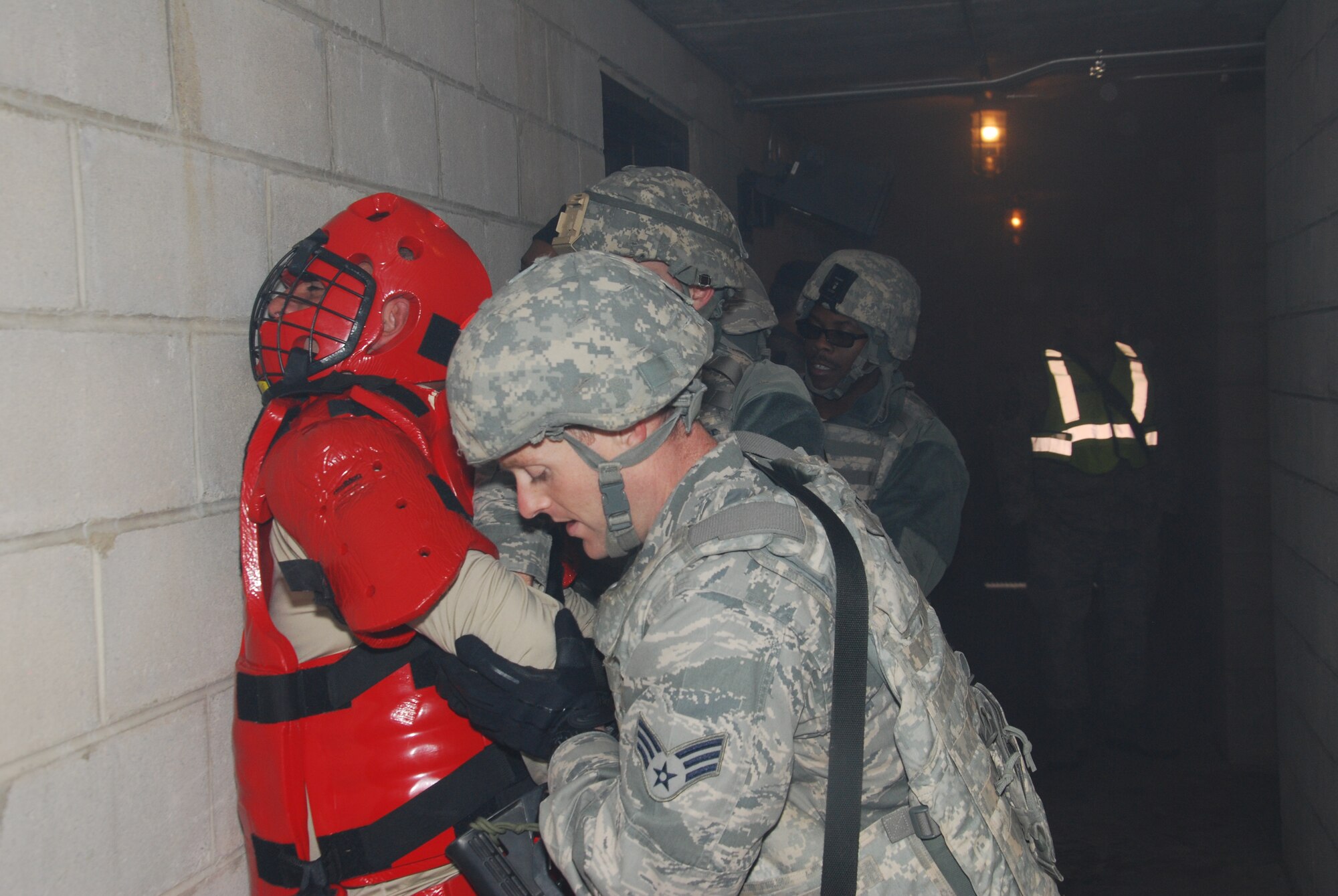 514th SFS members apprehend a suspected “bomb maker” during a training exercise at Range 59E combined arms collective training, Fort Dix, Nov. 16. (US Air Force photo/Tech. Sgt. Jonathan E. White)