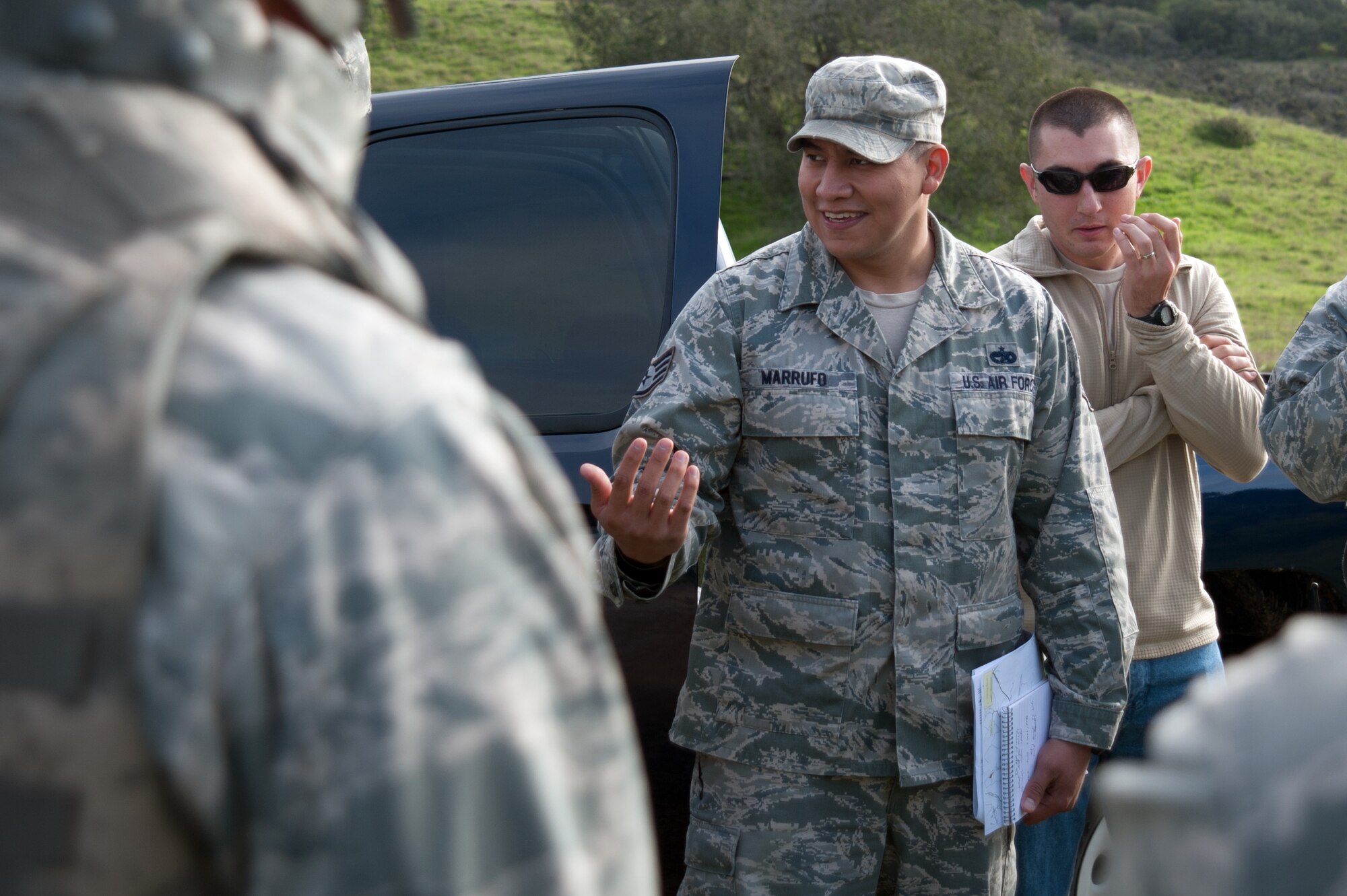 SSgt Daniel Marrufo, 30th Logistics Readiness Squadron Vehicle Operations Training, Validation and Operations Supervisor, critiques the 30 LRS convoy team during an after action report Dec. 18, 2014, Vandenberg Air Force Base, Calif. "I'm excited to conduct this type training because it's invaluable to our career field.” explains Marrufo. “Many of us have deployed to various locations to conduct combat convoy ops. I personally take this training very seriously, because I have lost two of my closest  friends while doing convoys, A1C Eric Barnes and SrA Ashton Goodman. I have done convoys both as a brand new Airman in the Lead Vehicle of the convoy, and as a Staff Sergeant as an Assistant  Convoy Commander. I really enjoyed the enthusiasm  the newer Vehicle Operators showed during this training. Everyone involved did really well during the scenarios and I know they gained a lot of knowledge from this  experience." SSgt Marrufo has been a Vehicle Operator for 8 years, deployed twice for 8 months each time; earning both an Army Commendation Medal, and a Meritorious Service Medal for his actions. (U.S. Air Force photo by Michael Peterson/Released)