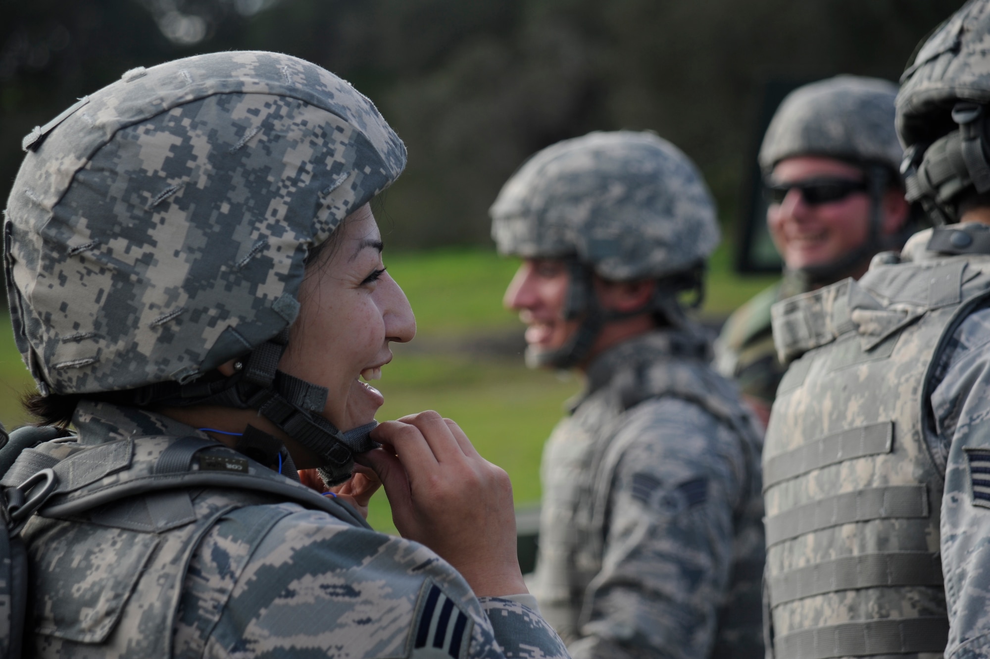 Senior Airman Rosemarie Rodriguez-Cruz, 30th Logistics Readiness Squadron dispatcher, joins her team members for an after action report after completing the first half of a simulated convoy mission Dec. 18, 2014, Vandenberg Air Force Base, Calif. Combat Operational Readiness Training includes exercise preparation actions to properly prepare Vehicle Operations personnel for wartime duties. Airmen must possess the necessary skills to meet mission demands and predict future events if possible. This training ensures personnel are able to operate and survive in a contingency or wartime environment as a team. (U.S. Air Force photo by Airman 1st Class Ian Dudley/Released)