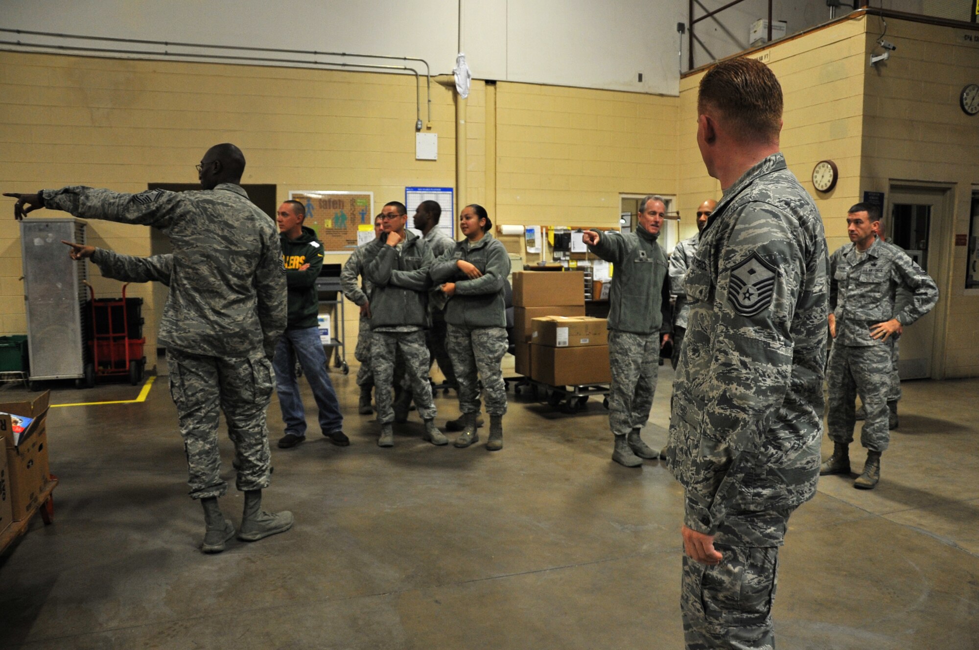 GOODFELLOW AIR FORCE BASE, Texas – Team Goodfellow members coordinate in preparation for Operation Warmheart at the commissary warehouse Dec. 23. Operation Warmheart is a program founded by the base first sergeants to assist Goodfellow members. (U.S. Air Force photo/ Airman 1st Class Scott Jackson)