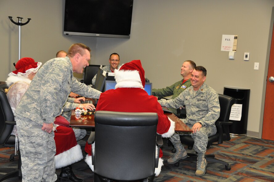 Santa and Mrs. Claus visits the Air Reserve Personnel Center Dec. 19, 2014, on Buckley Air Force Base, Colo. (U.S. Air Force photo/Tech. Sgt. Rob Hazelett)