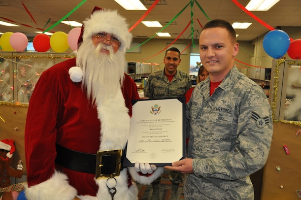 Santa Claus visits the Air Reserve Personnel Center Dec. 19, 2014, on Buckley Air Force Base, Colo. (U.S. Air Force photo/Tech. Sgt. Rob Hazelett)