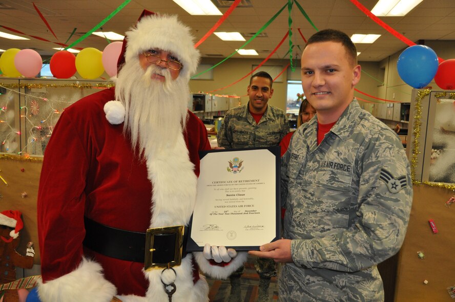 Santa Claus visits the Air Reserve Personnel Center Dec. 19, 2014, on Buckley Air Force Base, Colo. (U.S. Air Force photo/Tech. Sgt. Rob Hazelett)