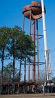 A contractor's crane hoists and positions a large section for a new water tower being built at Duke Field, Fla.  The new water tower will support water distribution capacity for future development planned for Duke's west side.  (U.S. Air Force photo/Tech. Sgt. Jasmin Taylor)
