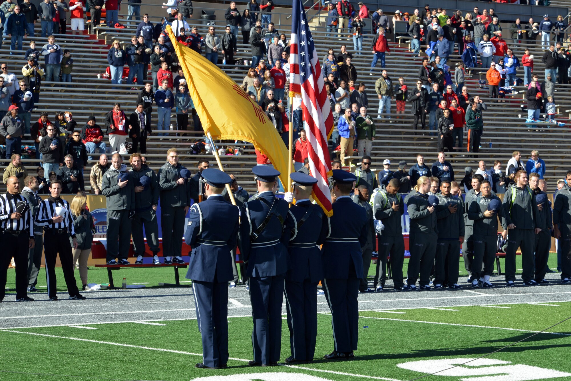 Members of the Kirtland Honor Guard present the colors at the New Mexico Bowl Dec. 20. The game took place at the University of New Mexico's Branch Field. (Photo by Ken Moore)
