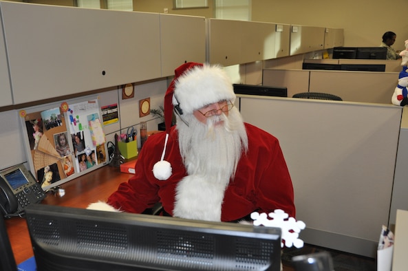 Santa Claus visits the Air Reserve Personnel Center Dec. 19, 2014, on Buckley Air Force Base, Colo. (U.S. Air Force photo/Tech. Sgt. Rob Hazelett)