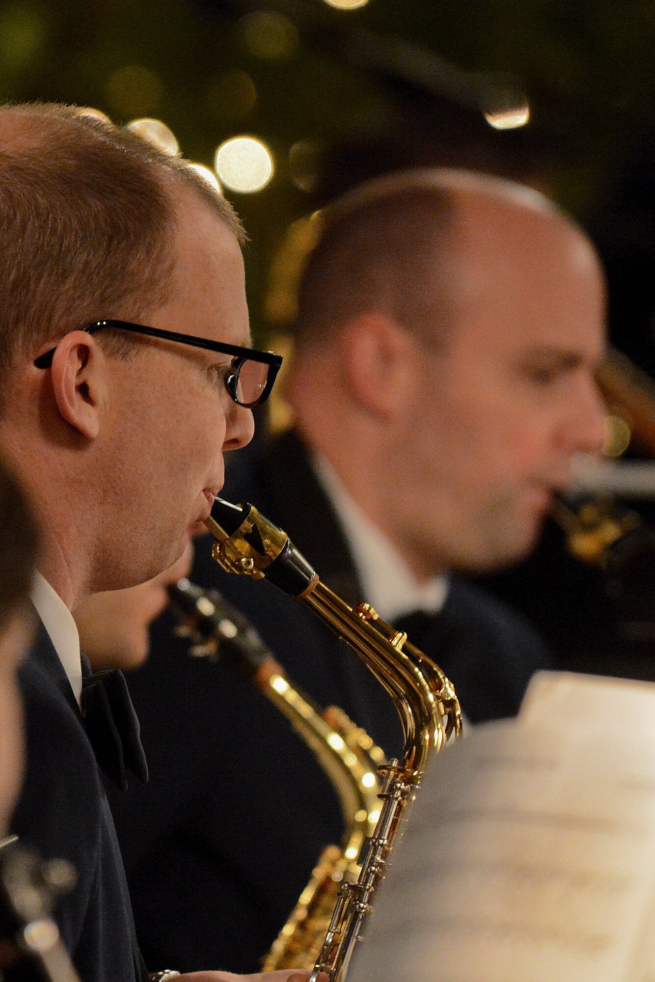 Staff Sgt. Nathan Herald, U.S. Air Forces in Europe band member, plays his saxophone during the USAFE band holiday concert in the Bury Cathedral in Bury St. Edmunds, England, Dec. 20, 2014. This was the band’s 18th concert on their 20-day holiday tour. (U.S. Air Force photo by Airman 1st Class Trevor T. McBride/Released)
