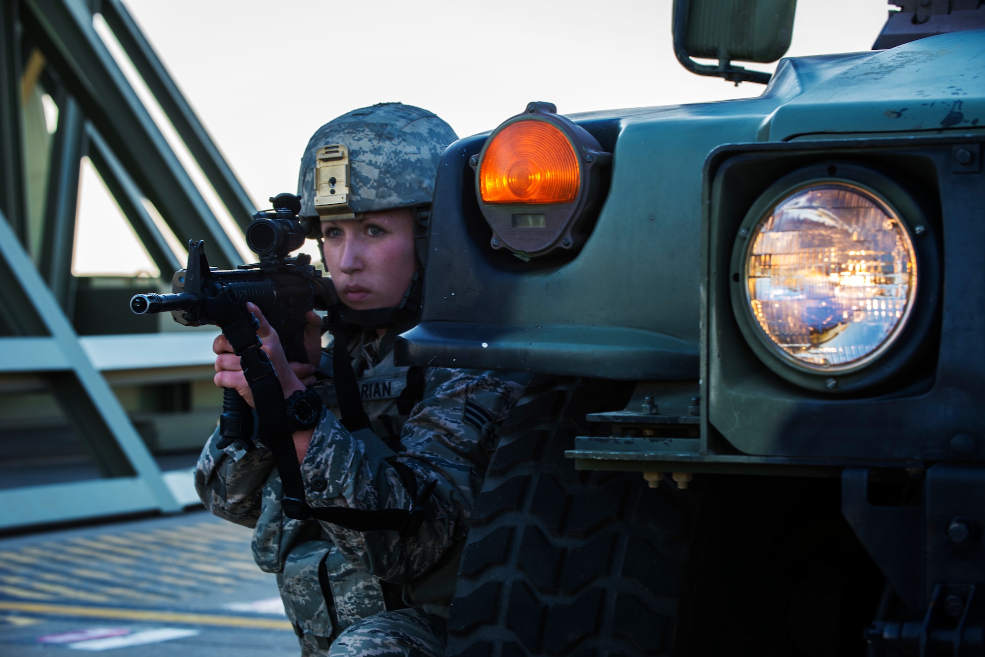 Senior Airman Jessica Varian, 39th Security Forces Squadron NCOIC of police services, provides security during an emergency response exercise Dec. 16, 2014, at Incirlik Air Base, Turkey. Defenders are the first line of defense during emergencies and down range operations. (U.S. Air Force photo by Airman Cory W. Bush/Released)
