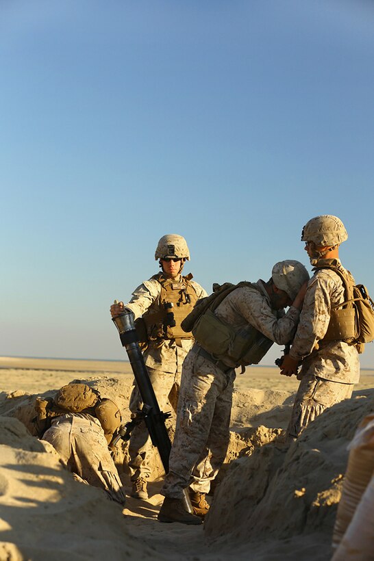 U.S. Marines fire an 81mm mortar round during a joint mortar range exercise with Royal Saudi Naval Forces Marines called Red Reef 15 in the U.S. 5th Fleet area of responsibility, Dec 13, 2014.