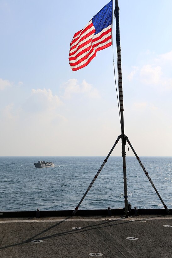 A landing craft utility carrying Sailors and Marines with the 11th Marine Expeditionary Unit (MEU) returns to the dock landing ship USS Comstock (LSD 45), following exercise Red Reef 15 in Ras Al Ghar, Saudi Arabia. Red Reef is part of a routine theater security cooperation engagement plan between the U.S. Navy, U.S. Marine Corps and Royal Saudi Naval Forces that serves as an excellent opportunity to strengthen tactical proficiency in critical mission areas and support long-term regional security. (U.S. Marine Corps photo by Sgt. Melissa Wenger/ Released)