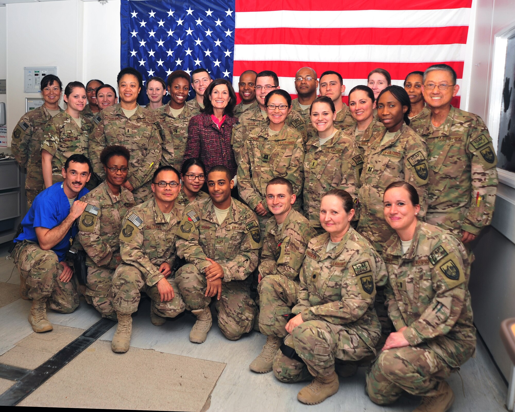 Betty Welsh, wife of U.S. Air Force Chief of Staff Gen. Mark A. Welsh III, poses with Airmen assigned to the 455th Expeditionary Medical Group’s Craig Joint Theater Hospital Dec. 15, 2014 during a visit to Bagram Airfield, Afghanistan. Mrs. Welsh also connected with Airmen from the 455th Expeditionary Aeromedical Evacuation Squadron during her visit. (U.S. Air Force photo by Staff Sgt. Whitney Amstutz/released)
